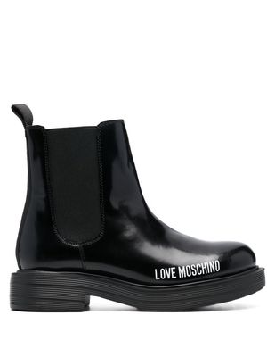 Love Moschino logo-print ankle-boots - Black