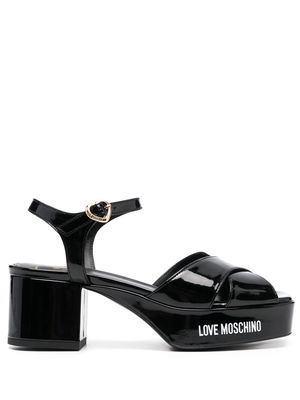 Love Moschino logo-print cross-strap sandals - Black