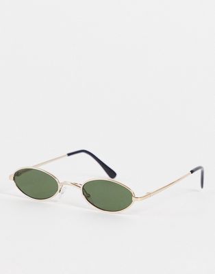 Madein slim oval sunglasses in black and gold