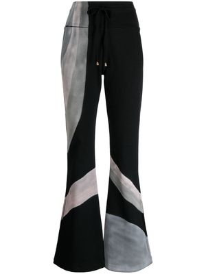 Madison.Maison x Designing Hollywood Hand-painted cotton track trousers - Black