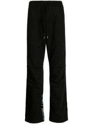 Maharishi Duelling Dragons-embroidered track pants - Black