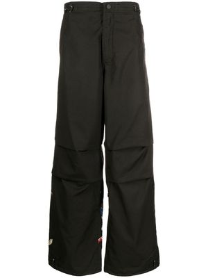 Maharishi graphic-print straight-leg trousers - Black