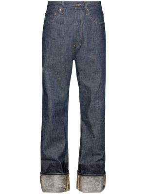 Maison Margiela Lacquered turn-up jeans - Blue