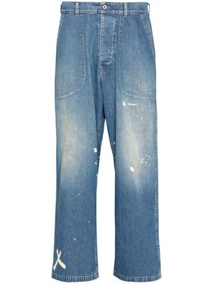 Maison Margiela paint-splatter wide-leg jeans - Blue