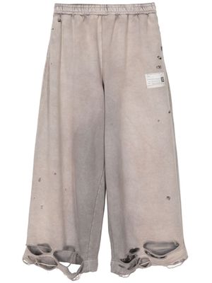 Maison MIHARA YASUHIRO distressed wide-leg track pants - Neutrals