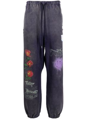 Maison Mihara Yasuhiro slogan-print cotton track pants - Purple