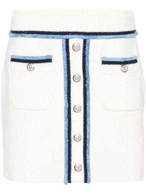 Maje decorative-buttons bouclé miniskirt - White