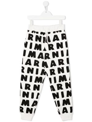 Marni Kids all-over logo print casual trousers - White