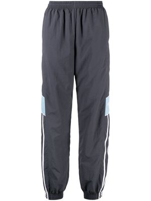 Martine Rose contrasting-panel logo-embroidery track pants - Blue