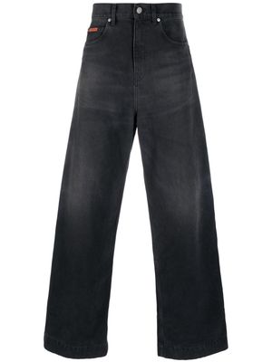 Martine Rose logo-patch wide-leg jeans - Black