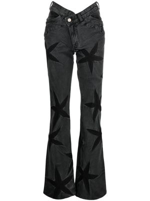 Masha Popova floral-patch bootcut jeans - Black