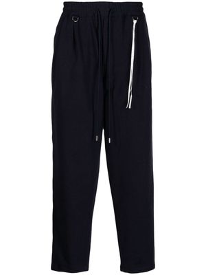 Mastermind Japan logo-embroidered tapered trousers - Blue