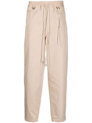 Mastermind Japan logo-embroidered tapered trousers - Neutrals