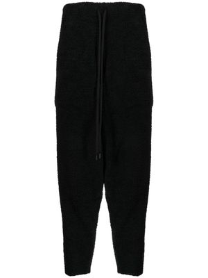 Mastermind World logo-print fleece-texture track pants - Black