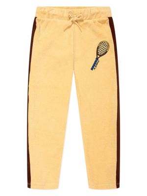 Mini Rodini racket-embroidered cotton track pants - Yellow
