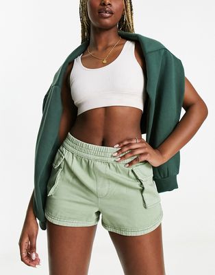 Miss Selfridge cargo pocket runner shorts in washed khaki-Green