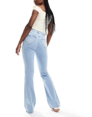 Miss Selfridge heart pocket flare jeans in bleach wash-Blue