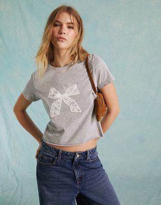 Miss Selfridge short sleeve baby tee with lace bow graphic in gray