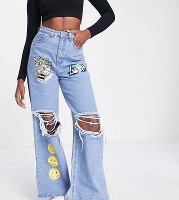 Missguided love graffiti style jeans in blue