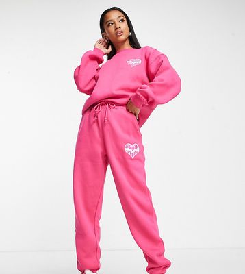 Missguided Petite good vibes sweatpants in bright pink - part of a set