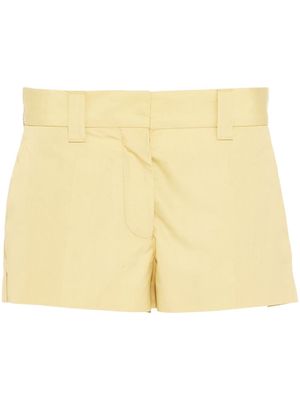 Miu Miu low-rise mini shorts - Yellow