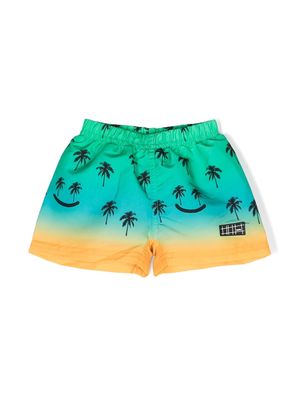 Molo Smiley-print swim shorts - Green