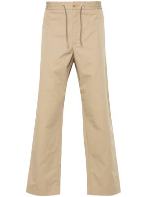 Moncler appliqué-logo cotton tapered trousers - Neutrals