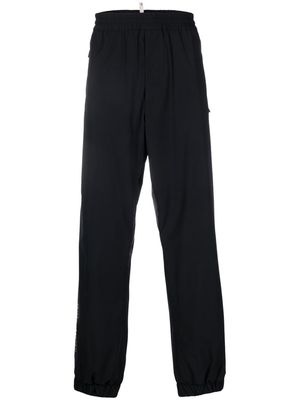 Moncler Grenoble logo-print straight-leg trousers - Black