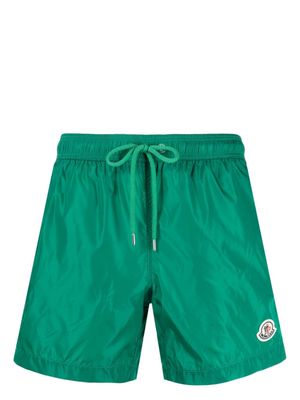 Moncler logo-appliqué swim shorts - Green