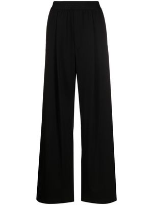 Moncler logo-waistband wide-leg trousers - Black