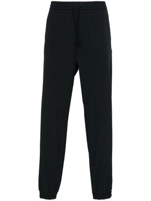 Moncler rubberised-logo elasticated-ankles trousers - Black