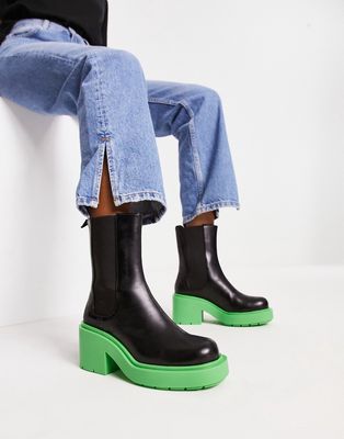 Monki boot with green chunky sole in black