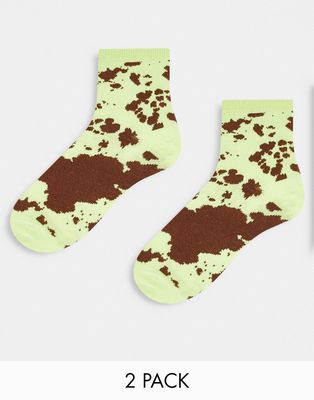 Monki cow print ankle socks in green and brown