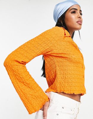 Monki crinkle shirt with long sleeve in orange