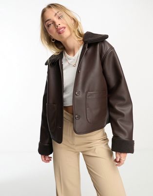 Monki cropped faux leather and shearling jacket in brown
