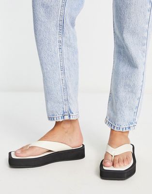 Monki faux leather thong sandals in black and white-Multi