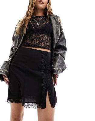 Monki lace trim mini skirt with thigh split in black