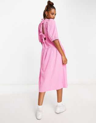 Monki midi puff sleeve dress with cut out bow back in pink
