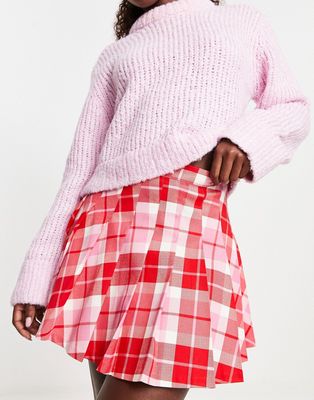 Monki pleated mini kilt skirt in pink and red check