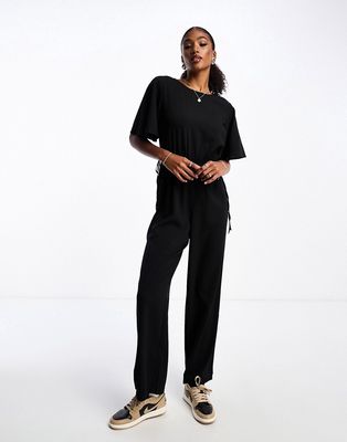 Monki relaxed jumpsuit in black