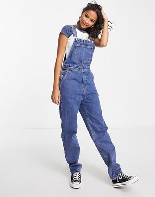 Monki relaxed overalls with contrast detail in light wash denim-Blue