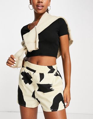 Monki relaxed shorts with elasticized waist in abstract print-Neutral