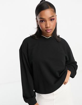 Monki round neck long sleeve sweatshirt in black