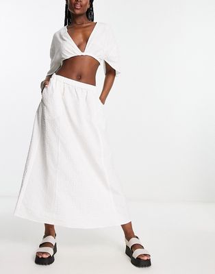 Monki solid jacquard flower midi skirt in white-Multi