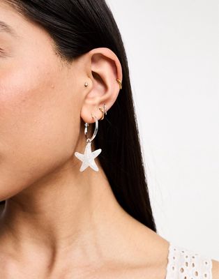 Monki star fish earrings in white