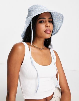 Monki sun hat with chin tie in blue daisy print