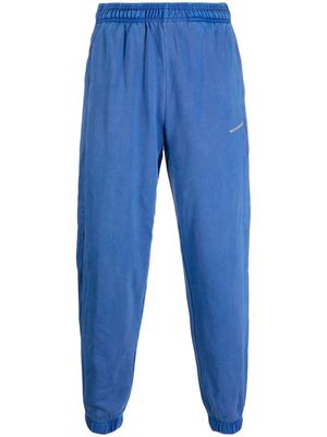 MONOCHROME logo-embossed cotton track pants - Blue