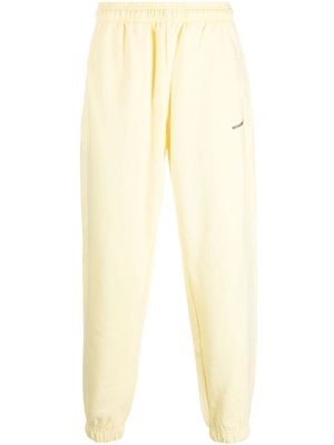 MONOCHROME logo-embossed cotton track pants - Yellow