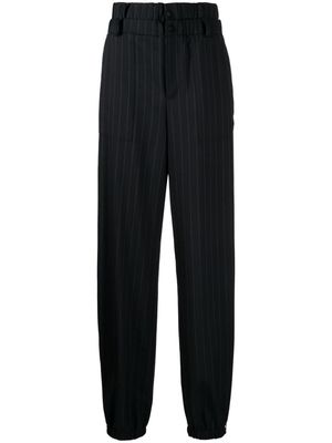 Monse high-waisted pinstripe tailored trousers - Black