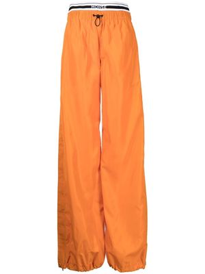 Monse logo waistband parachute trousers - Orange